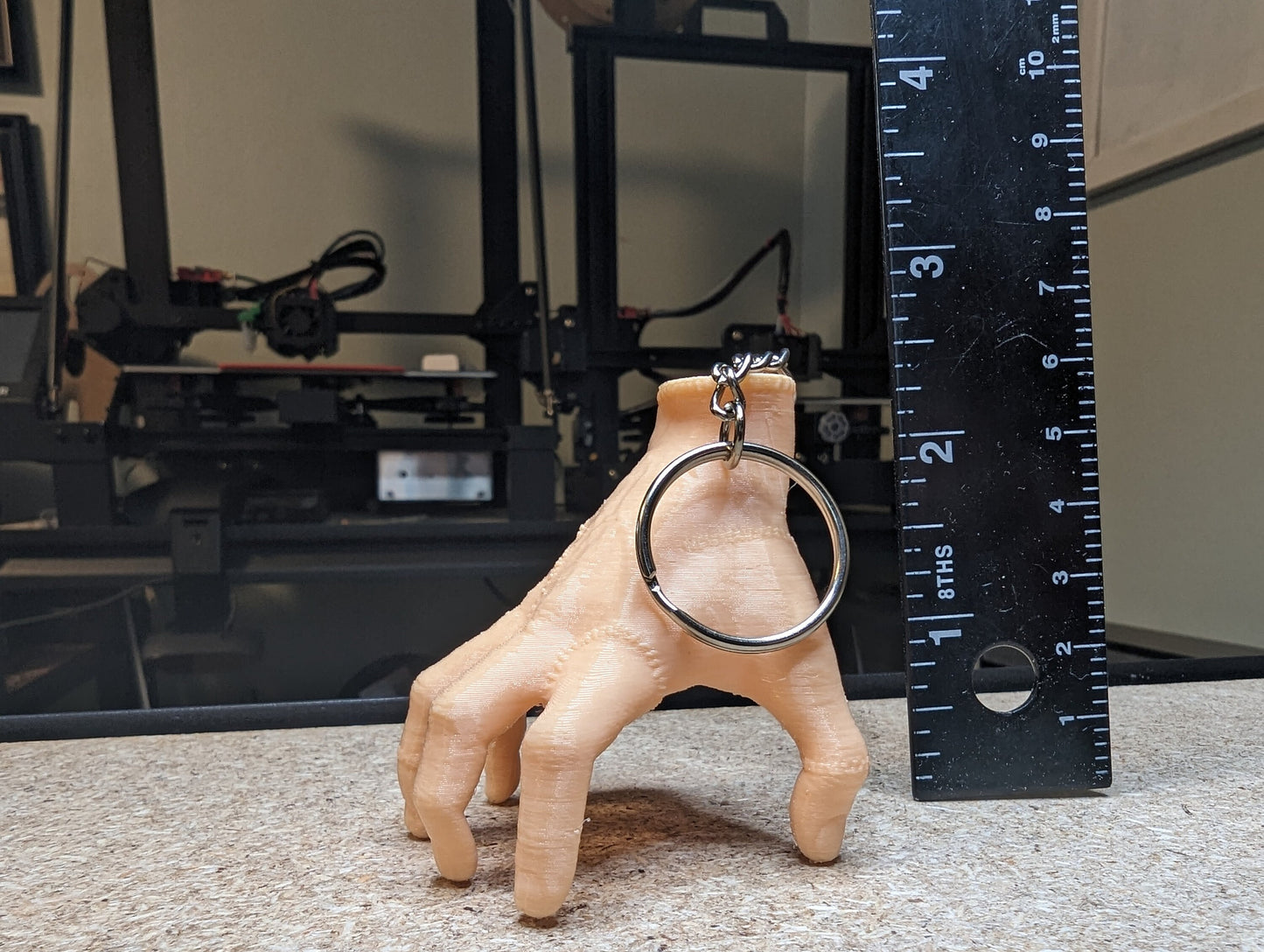 3D Printed Thing Hand Keychain: A Spooky and Fun Accessory for Any Outfit